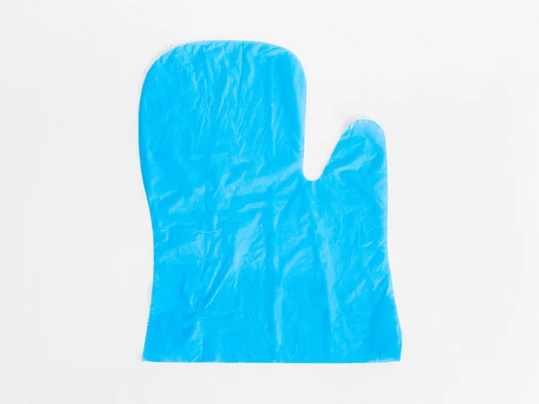 Luva higiênica Pet Clean azul, estendida, com a sobrinha lateral que serve para amarrar o descarte.